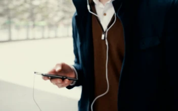 Stock Footage Young Student Listening To Music From His Mobile Free