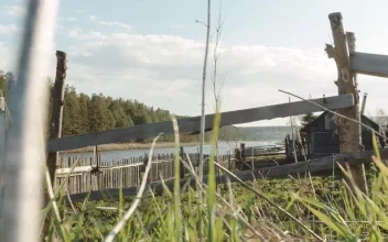 Stock Footage Wooden Fence Running Along A River Free