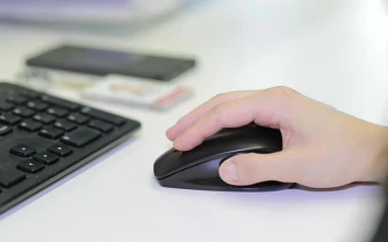 Stock Footage Woman Using A Wireless Mouse Free