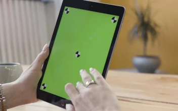 Stock Footage Woman Scrolling Down On A Tablet Free