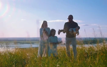 Stock Footage Young Family Enjoying The Sun At The Valley Free
