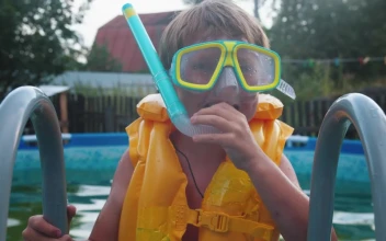Stock Footage Young Boy With Inflatable Vest And Snorkel Equipment Free