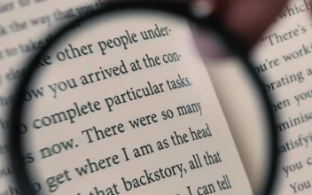 Stock Footage Woman Reading A Book Helped By A Magnifying Glass Free
