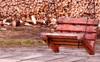 Stock Footage Wooden Swing On Chains Free