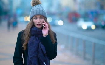 Stock Footage Woman Talking On The Phone In The Street Free