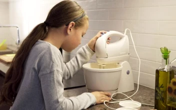 Stock Footage Young Girl Mixing Dough In The Kitchen Free