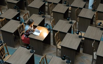 Stock Footage Woman Reading Alone In Study Hall Free