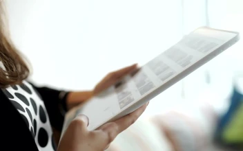 Stock Footage Woman Scrolls Through Instagram Photos On Tablet Free