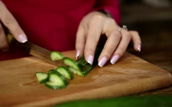 Stock Footage Woman Cutting Cucumber Free