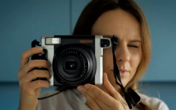 Stock Footage Woman Taking A Picture With An Instant Camera Free