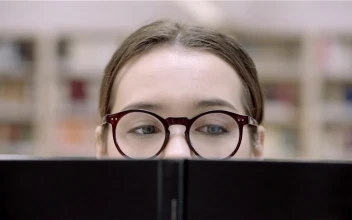 Stock Footage Woman Eyes With Glasses Reading A Book Free