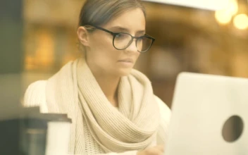Stock Footage Woman Working On A Laptop At The Coffee Shop Free