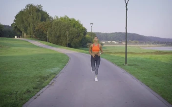 Stock Footage Woman Finishes Jogging Free