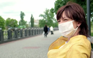 Stock Footage Woman Wearing Face Mask On Park Bench Free
