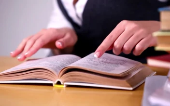 Stock Footage Woman Looking For Information In A Book At Library Free