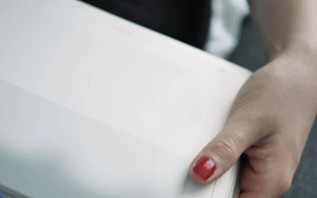 Stock Footage Woman Turning Pages Of A Book In Close Up Shot Free