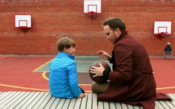 Stock Footage Young Man And His Little Brother On The Basketball Playground Free