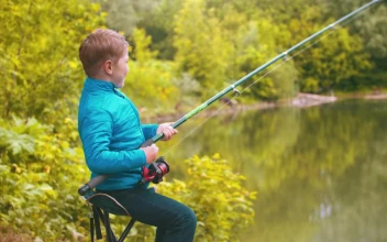 Stock Footage Young Boy With A Fishing Rod At The Lake Free