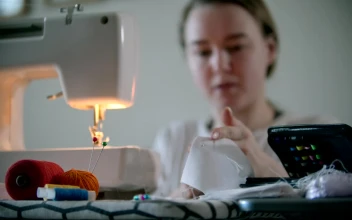 Stock Footage Woman Sewing A Protective Mask For The Pandemic Free