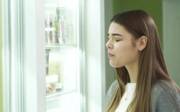 Stock Footage Young Woman Winces And Rubs Face In Pain Free