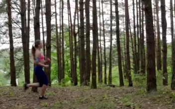 Stock Footage Woman Running Through The Forest Free