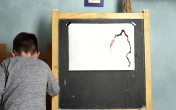 Stock Footage Young Boy Painting A Picture Free