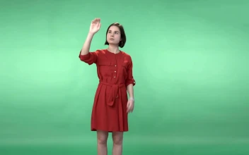 Stock Footage Woman In A Dress Using A Virtual Screen Free
