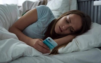 Stock Footage Woman Using Her Phone In Bed Free