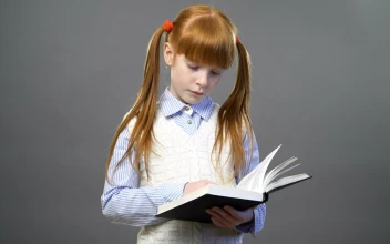 Stock Footage Young Girl With An Open Book Free