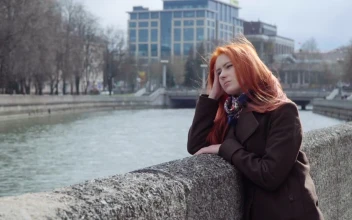 Stock Footage Woman Looking Out Over A River Free