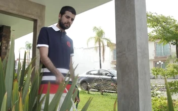 Stock Footage Young Man Watering His Home Garden Free