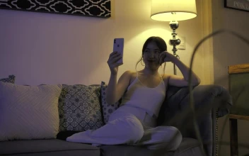 Stock Footage Woman Resting On A Sofa While Talking On Video Call Free