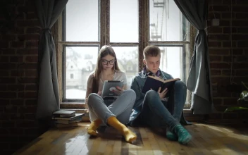 Stock Footage Young Students Helping Each Other Study By Window Free