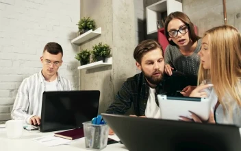Stock Footage Young Team Brainstorms Ideas While Working In Modern Office Free