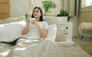 Stock Footage Woman Opens Video Call On Futuristic Hologram Panel In Bed Free