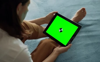 Stock Footage Woman Holds Greenscreen Tablet With Chroma Key Free