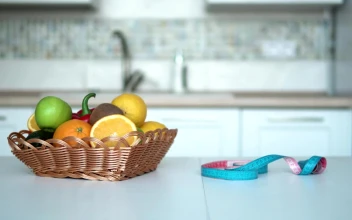Stock Footage Woman Measures Weight Loss Progress In Kitchen Free