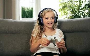 Stock Footage Young Girl Console Gaming On Sofa Cheers In Victory Free