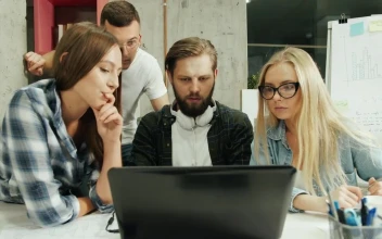 Stock Footage Young Creative Team Celebrate Win Over Laptop Free