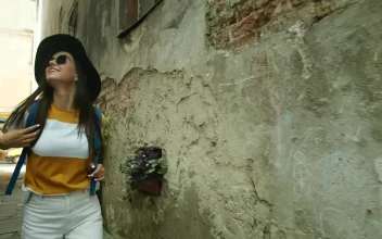 Stock Footage Woman Touring Rome Looks Up At Old Building Free