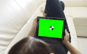 Stock Footage Woman Looking At Chroma Key Website On Tablet Free