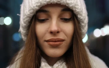 Stock Footage Woman In Winter Hat Smiles With Perfect Teeth Free