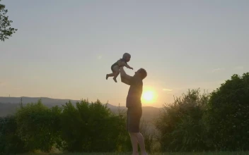 Stock Footage Young Baby Being Raised In The Air Free