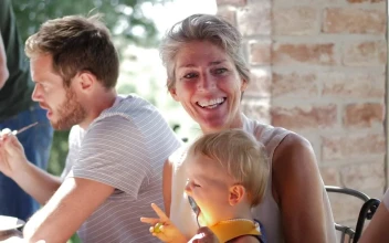 Stock Footage Young Family Having Dinner Free