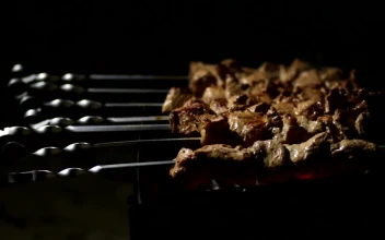 Stock Footage Woman Cooking Meat Skewers Free
