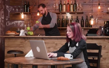 Stock Footage Woman Emailing While Having Breakfast Free