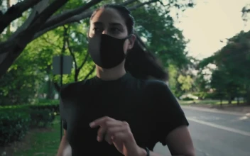 Stock Footage Young Woman Running With Mask On The Street Free