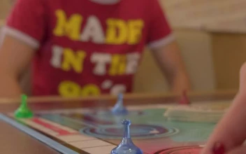 Stock Footage Young People Playing A Board Game With Cards Free