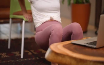 Stock Footage Woman Following An Online Workout Class Free