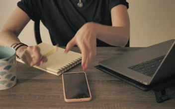 Stock Footage Young Woman Stops Her Work To Answer A Call Free